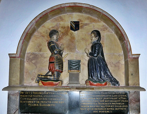 Tomb showing kneeling man and woman